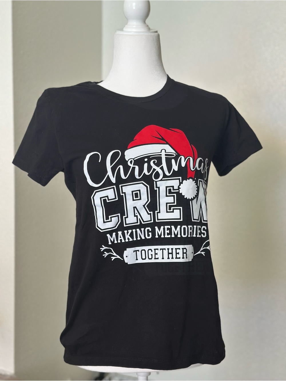 Next Level Apparel Black Christmas Crew Tee with Red Santa Hat